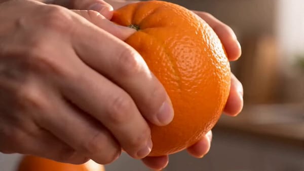 0:00–0:02 start with orange peeling one by one. Transitions should feel seamless and rhythmic. Audi… prompt example