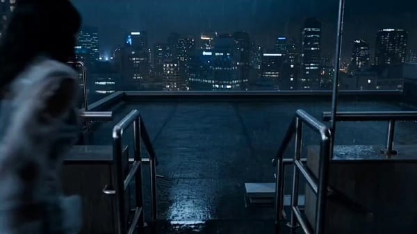 Seamless continuation from elevator fight: Prachii runs up emergency stairs to the rooftop of t…