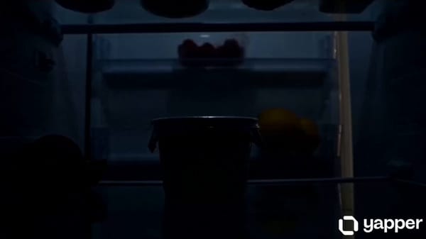 The scene begins from the perspective of a chilled, glowing refrigerator interior, mist curling…