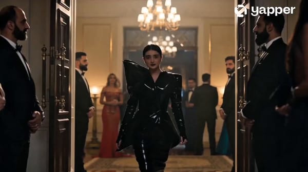 Characters: Woman matching ref:image-1, but styled in an avant-garde, structural black dress wi…