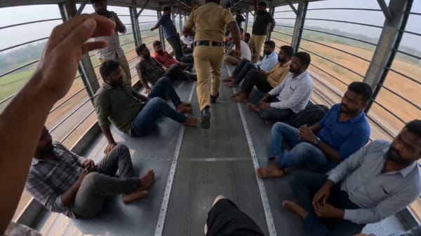 Realistic pov go pro footage of a man running on top of a train in India, being chased by local…