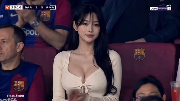Ultra-realistic sports broadcast still of a glamorous Asian woman sitting in the stands of Camp Nou… prompt example