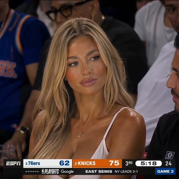 Cinematic live NBA broadcast style video, ESPN-style 16:9, ultra realistic courtside camera sho…