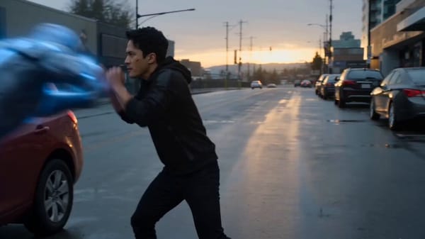 An intense, cinematic, slow-motion action sequence on a damp, overcast city street during dusk.…