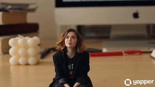 Ultra-realistic cinematic macro live-action video of a tiny human woman from @image1 living nat…