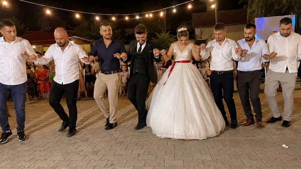 Prompt: 15-second cinematic Turkish wedding celebration, inspired by the attached reference image.… prompt example