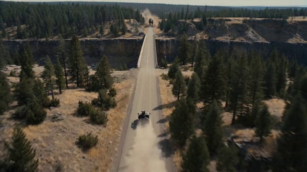 Shot 1: Begin with a wide cinematic aerial shot of the military jeep speeding along the highway…