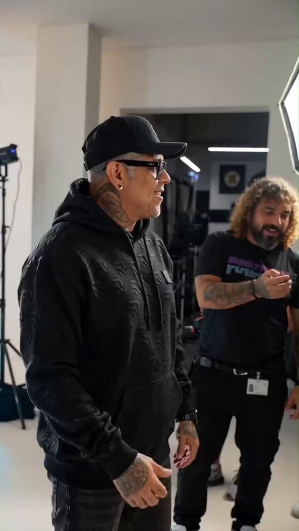 Behind-the-scenes documentary footage capturing the moments before the final take. The scene fe…