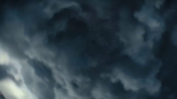 "A colossal ancient storm dragon with obsidian-black scales and glowing blue lightning veins er…