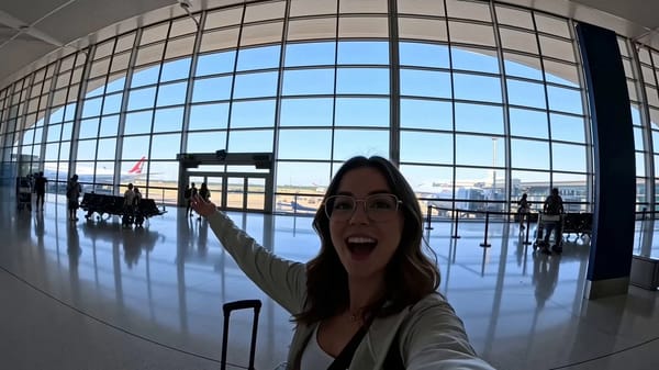 Create a cinematic hyperlapse selfie travel vlog following a single traveler across the New 7 W…