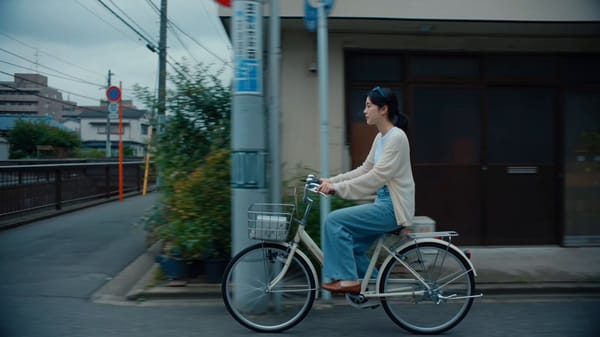 SUBJECT : Young Japanese woman, early 20s, natural refined everyday look. Oversized cream cardi…