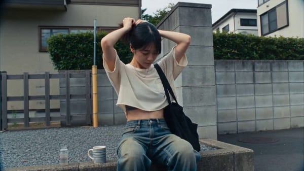 Main subject: Young Japanese woman, early 20s, natural everyday appearance, effortless modern T…
