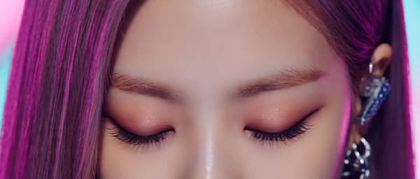 Style: High budget Kpop music video, glossy commercial lighting, vibrant color grading (magenta…