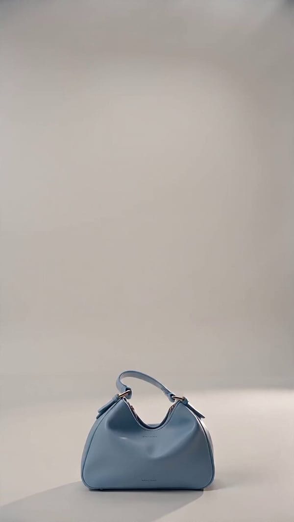 Fast-paced fun lifestyle montage with light blue handbag as hero: woman with headphones eating…