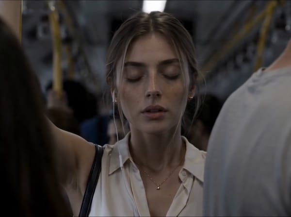 Three reference images: The woman in [image1], the crowded bus interior in [image2], and the st…