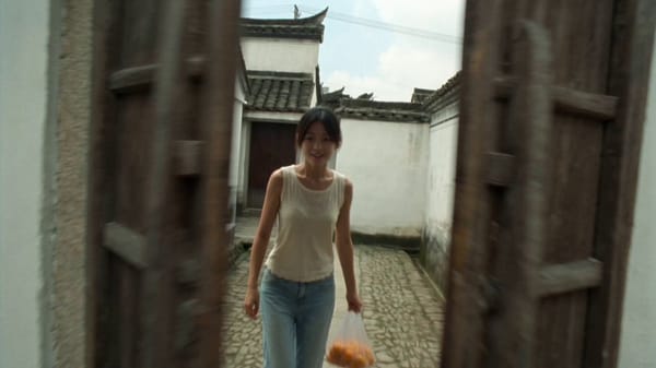 Main Subject: Young Chinese woman, early 20s. Natural appearance. Black hair loosely tied back…