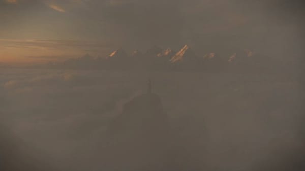15-second ultra-cinematic mythological transformation sequence atop a towering mountain summit…