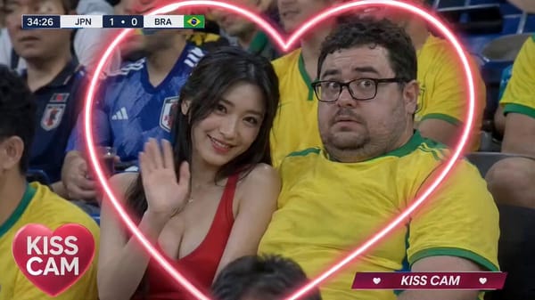 Style: Hyper-realistic live World CUP Kiss-cam broadcast footage, authentic televised sports co…
