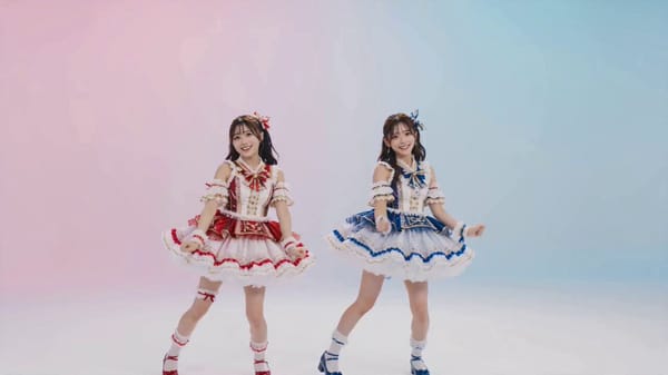 参照画像の二人を主人公として使用。15秒、24fps。フォトリアル映像。映画CMレベルの超高品質シネマティック映像。自然な肌質、リアルな髪の毛の動き、繊細なライティング、浅い被写界深度、高品…