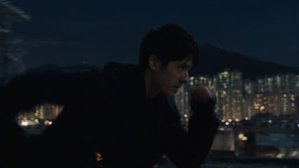 A cinematic one-continuous-shot action scene, live-action photorealistic style, 35mm film grain…