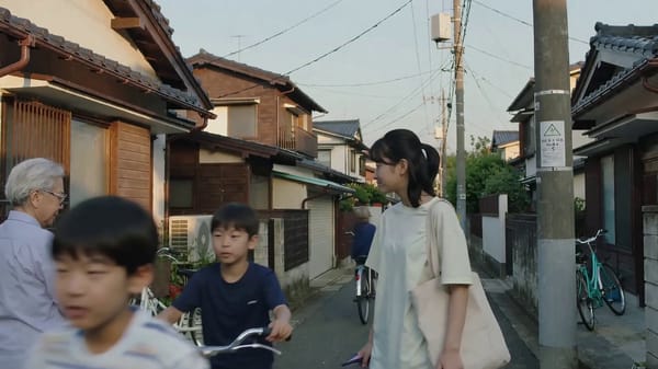 Create an ultra-realistic cinematic slice-of-life video set in a peaceful Japanese residential…