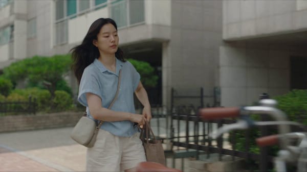 30-Second Cinematic Ultra-photorealistic Korean summer lifestyle video following a young woman…