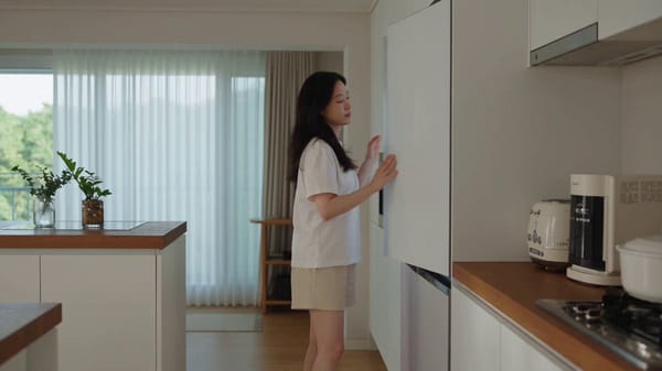 Ultra-photorealistic Korean summer lifestyle scene featuring a young woman preparing a refreshi…