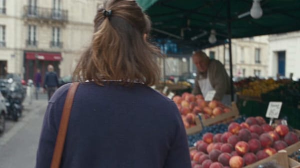 Main Subject: Young French woman, 23, natural everyday appearance, shoulder-length chestnut-bro…