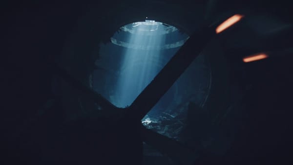 15s, 16:9, ultra-realistic underwater sci-fi action film, cinematic live-action VFX, deep blue…