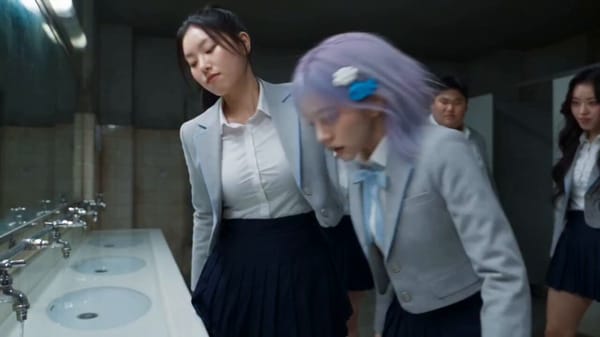 Cinematic live-action action scene set inside a dimly lit gritty high school bathroom The prota…