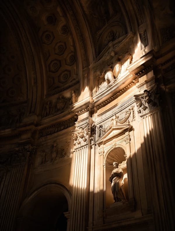 A stunning interior architectural photograph looking up at the curved walls and vaulted ceilings of… prompt example
